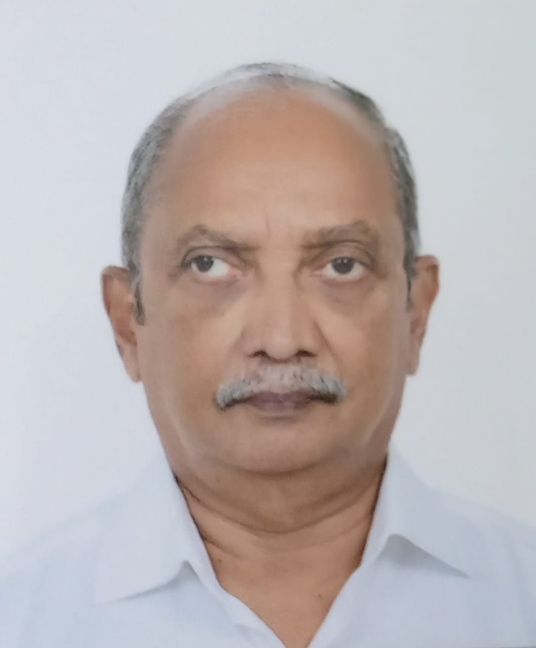 Dr Dinesh K